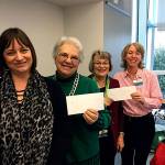 Members of Guild 18 present a pair of checks to Mary Lou Finley, president of Providence General Children&rsquo;s Association. (Contributed photo)