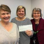 Members of Guild 15 present a check to Providence General Children&rsquo;s Association Board President Mary Lou Finley. (Contributed photo)