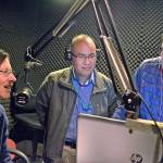 Josefina Beecher (left), of the Skagit Immigrants Rights Council, interpreter Fidel Castellanos and producer Miguel Angel Gaitan do a radio program called Ecos de la Comunidad: Local News & Information in Spanish at KSVR in Mount Vernon on April 14. The station gives people the opportunity to call and ask questions regarding immigration. (Scott Terrell/Skagit Valley Herald via AP)
