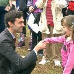 In a March 27 photo, Democratic congressional candidate Jon Ossoff is seen with supporters outside of the East Roswell Branch Library in Roswell, Georgia, on the first day of early voting. (AP Photo/Alex Sanz)