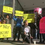 Protesters hold up signs outside a courthouse where a federal judge will hear arguments in the first lawsuit challenging President Donald Trump&rsquo;s executive order to withhold funding from communities that limit cooperation with immigration authorities Friday, April 14, in San Francisco. (AP Photo/Haven Daley)