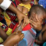 In this July 2016 photo, residents of the Kisenso district of Kinshasa receive yellow fever vaccines. (AP Photo/Jerome Delay)