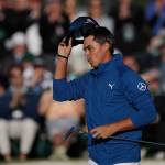 Rickie Fowler tips his hat on the 18th green during the second round of the Masters golf tournament on April 7, 2017, in Augusta, Ga. (AP Photo/Matt Slocum)