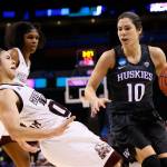 Washington guard Kelsey Plum (10) drives past Mississippi State guard Dominique Dillingham during the second half of an NCAA Tournament game March 24, 2017, in Oklahoma City. (AP Photo/Sue Ogrocki)