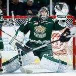 Silvertips goalie Carter Hart makes a glove save during a game against Calgary on Nov. 15, 2016, at Xfinity Arena in Everett. (Ian Terry / The Herald)