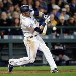 The Mariners&rsquo; Mitch Haniger doubles in a pair of runs against the Marlins in the fourth inning of a game April 19, 2017, in Seattle. (AP Photo/Elaine Thompson)
