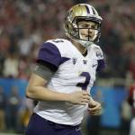 Washington quarterback Jake Browning (3) runs off the field against Alabama during the first half of the Peach Bowl on Dec. 31, 2016, in Atlanta. (AP Photo/David Goldman)