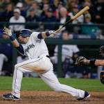 The Mariners&rsquo; Mitch Haniger follows through on a double against the Marlins during the ninth inning of a game April 18, 2017, in Seattle. (AP Photo/Ted S. Warren)