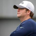 Seattle Seahawks general manager John Schneider watches his team work out during training camp on Aug. 6, 2016, in Renton. (Ted S. Warren / Associated Press, file)