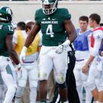 Michigan State&rsquo;s Malik McDowell (4) celebrates a play during a game against Furman on Sept. 2, 2016, in East Lansing, Mich. (AP Photo/Al Goldis)