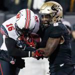 Colorado defensive back Tedric Thompson (right) tackles Utah wide receiver Cory Butler-Byrd during a game Nov. 26, 2016, in Boulder, Colo. (AP Photo/David Zalubowski)