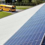 Solar panels are installed Friday afternoon at Marysville Pilchuck High School in Marysville on April 21, 2017. (Kevin Clark / The Herald)