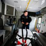 Darrington firefighter Drew Bono walks through the back of a new ambulance purchased with federal grant money on April 25. The new ambulance is the first in Darrington to have bariatric capabilities and four-wheel drive for better handling on the area&rsquo;s many dirt roads. (Ian Terry / The Herald)