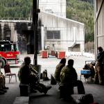 Jason Isotalo (right), captain of Fire District 1, teaches recruits about the stages of fire escalation at the Washington State Fire Training Academy near North Bend on Tuesday. (Ian Terry / The Herald)