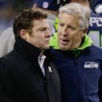 Seattle Seahawks general manager John Schneider (left) talks with head coach Pete Carroll before an NFL football NFC wild card playoff game against the Detroit Lions on Jan. 7 in Seattle. (AP Photo/Stephen Brashear, file)