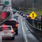 Westbound cars merge from Highway 204 and 20th Street Southeast onto the trestle during the morning commute on Thursday in Lake Stevens. (Ian Terry / The Herald)