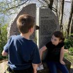The writer&rsquo;s son, Charlie, 9, and daughter, Grace, 6, check out the the Fairhaven-Whatcom boundary marker along the South Bay Trail. (Aaron Swaney photo)