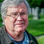 David Dilgard, a historian with the Everett Public Library, speaks to members of the Everett Mayor&rsquo;s Youth Council during his guided tour of the Evergreen Cemetery in October 2010. (Herald file)
