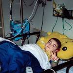 Jacob Peterson during his stay at Seattle Children’s Hospital for a heart transplant in 2000. His Pokemon Pikachu pillow was a constant companion that he still had as an adult. Peterson died April 10 at age 22. (Peterson family photo)
