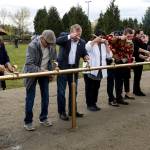 Community leaders take a ceremonial first sip of water. (Ian Terry / The Herald)
