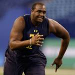 Mississippi State offensive lineman Justin Senior runs a drill at the NFL scouting combine on March 3, 2017, in Indianapolis. (AP Photo/Michael Conroy)