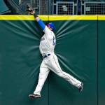 Seattle Mariners center fielder Mitch Haniger makes a leaping catch at the wall to rob Texas Rangers&rsquo; Joey Gallo of a two-run home run with the score tied in the eighth inning, Sunday, April 16, in Seattle. (AP Photo/Ted S. Warren)