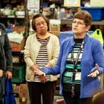 Amy Howell, Assistant Director and Program Manager at the Marysville Community Food Bank, announces to her volunteers that funding may potentially dry up during a food packing session on Thursday, April 27. (Ian Terry / The Herald)