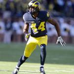Michigan safety Delano Hill follows the play during the first half of a ame against Illinois on Oct. 22, 2016 in Ann Arbor, Mich. (AP Photo/Carlos Osorio)
