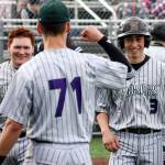 Edmonds-Woodway&rsquo;s Julian Kodama (71) awaits teammates Sam Alvarado (right) and Garrison Krohn (left) after they scored during a game against Meadowdale on April 12, 2017, at Mountlake Terrace High School. (Kevin Clark / The Herald)