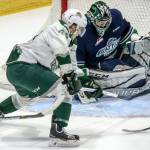 The Silvertips&rsquo; Connor Dewar scores a goal in the first period past Thunderbirds goalie Carl Stankowski during Game 2 of their playoff series on April 8, 2017, at Xfinity Arena in Everett. (Kevin Clark / The Herald)