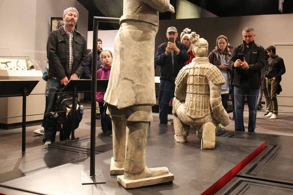 Crowds work their way around the Terracotta Warriors of the First Emperor exhibit at the Pacific Science Center in Seattle. (Kevin Clark / The Herald)
