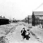 Two children at the Minidoka War Relocation Center, a Japanese internment camp the U.S. government operated in southcentral Idaho during World War II. Cascade High School recently hosted Atsushi Kiuchi, 87, who spent time at Minidoka as a young man. (National Archives photos)