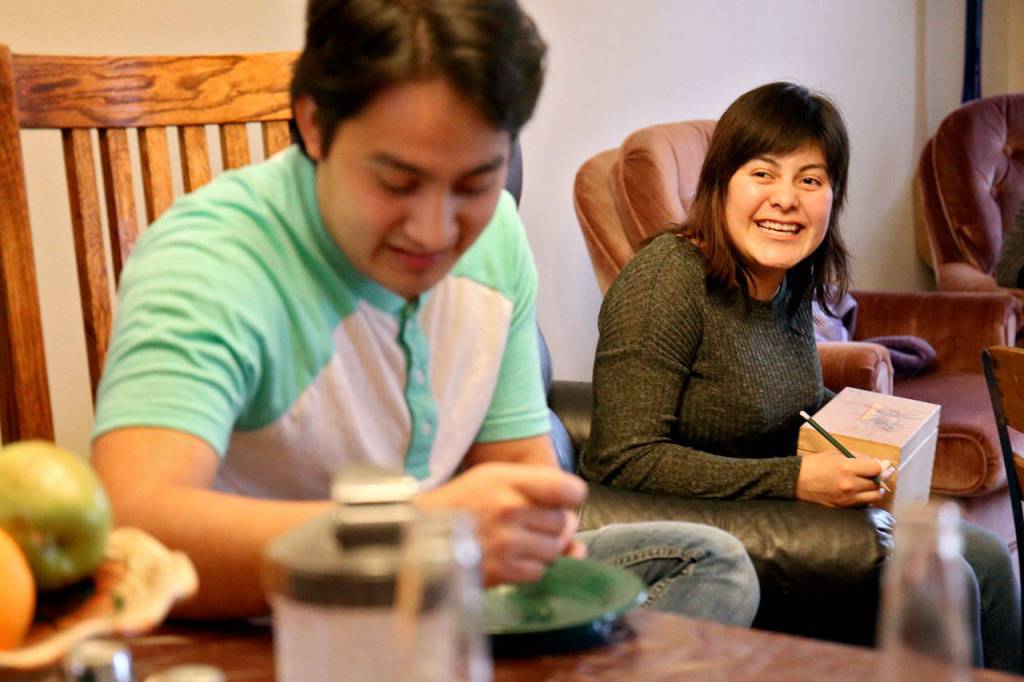 Reina Martinez-Hernandez, right, pokes fun at her younger brother Miguel.                                (Kevin Clark / The Herald)
