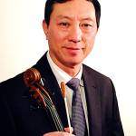 Fred Chu leads the Pacifica Chamber Orchestra from his seat as a violinist. The ensemble performs a matinee concert Sunday in Everett.