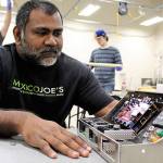 Mark Walsh, who served in the Air Force and who is attending Washington State University in Everett, is writing code leading the rewiring process for the Mars rover project. The WSU Everett Engineering Club placed second last year in the University Rover Challenge. (Contributed photo)