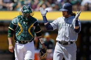 Motter’s slam helps M’s snap out of funk in 11-1 win over A’s