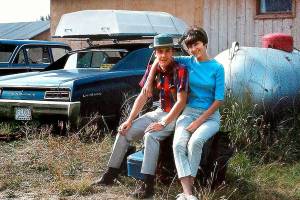 Newlyweds Bob and Sue Banks pose for a picture while on a fishing trip to Little Fort, British Columbia, in the spring of 1968. Their boat is atop Bob&rsquo;s 1967 Pontiac LeMans Sprint, which he bought two days after returning from serving with the Navy in the Vietnam War in April 1967. (Courtesy Bob and Sue Banks)