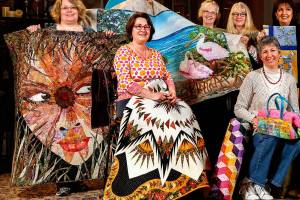 A first-ever Everett Quilt Show is scheduled for Friday and Saturday at Xfinity Arena conference center. It&rsquo;s presented by some extraordinarily talented quilters in the Marysville-based All in Stitches Quilt Guild. They met Tuesday at the Living Room Coffee House, bringing with them a few masterpieces. From left are Tammy Mohiswarnath, Grace Hawley, Becky Ray, Kathy McNeil, Cathryn Scott, Shawna Gould, Darlene McCourt, Vicki Hesseltine and Shirley Rock.