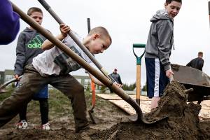 Volunteers get baseball field at Stanwood school game-ready