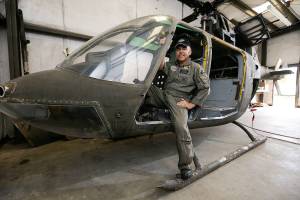 Volunteers turning vintage helicopter into kid-friendly float