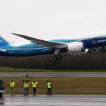 Workers cheer and wave as Boeing&rsquo;s 787 Dreamliner takes off from Paine Field on Dec. 15, 2009. (Justin Best / The Herald