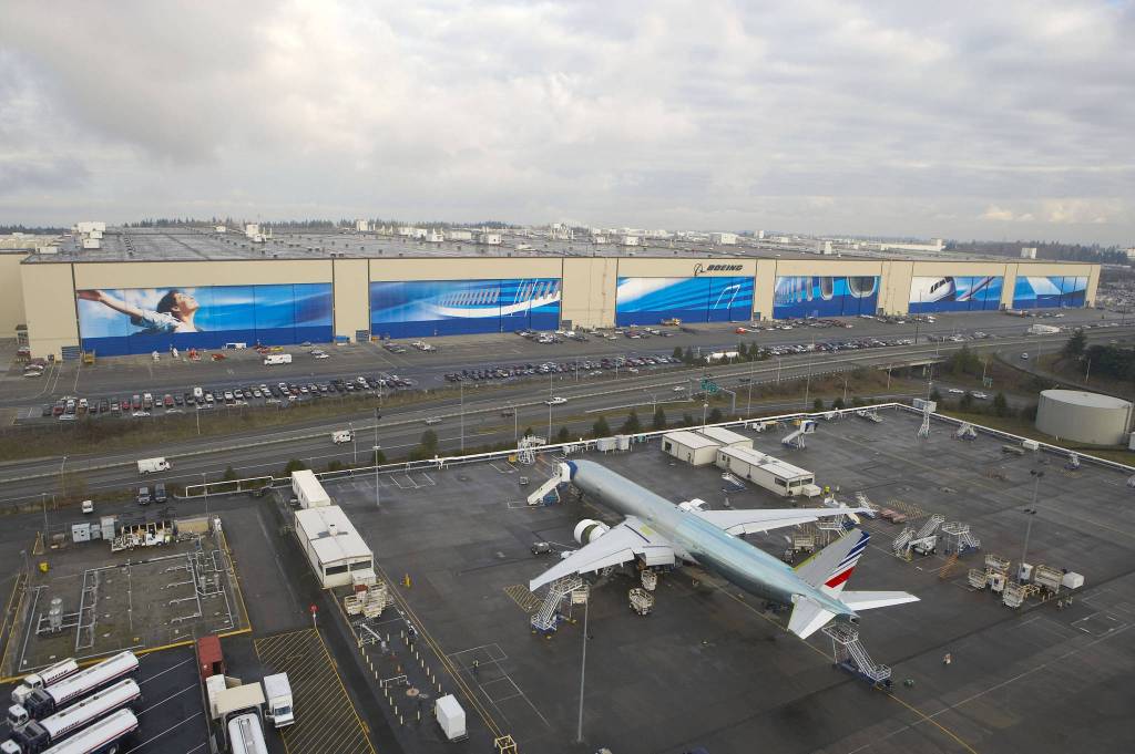 The Boeing assembly plant in Everett is adorned with murals that set a Guinness world record. A mural was applied to all six assembly bay doors, which are each 82 feet high and 300 to 350 feet wide &mdash; about the length of a National Football League field. (Photo Courtesy The Boeing Co.)