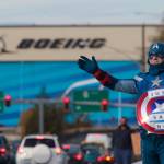 Dressed as Captain America, James White, a machinist with 17 years experience at Boeing, encourages members to vote no during the shift change in Everett on Nov. 11, 2013. (Mark Mulligan / The Herald)