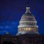 The Capitol is seen at dawn in Washington earlier this month. Top Capitol Hill negotiators reached agreement early Monday morning on a $1 trillion-plus spending bill that would fund the day-to-day operations of virtually every federal agency through Oct. 1. The House and Senate have until Friday at midnight to pass the measure to avert a government shutdown. (Associated Press)