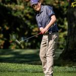 Everett&rsquo;s Austin Duffy putts on the 18th hole during a tournament at Legion Memorial Golf Course in Everett on May 3. (Ian Terry / The Herald)