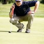 Everett&rsquo;s Josef Koznek lines up a putt during a tournament at Legion Memorial Golf Course in Everett on May 3. (Ian Terry / The Herald)