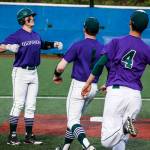 Edmonds-Woodway&rsquo;s Brandon Mitchell (left) celebrates his walk-off hit in the bottom of the ninth inning of a 3A District 1 semifinal game against Snohomish on May 9, 2017, at Meridian Park Fields. (Ian Terry / The Herald)