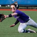Edmonds-Woodway center fielder Ian Michael makes a diving catch to prevent a run from scoring in extra innings during a 3A District 1 semifinal game against Snohomish on May 9, 2017, at Meridian Park Fields. (Ian Terry / The Herald)