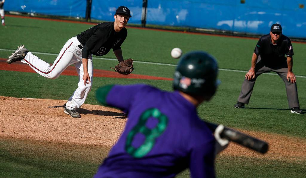 Snohomish pitcher Kyle Sandifer delivers a pitch during a 3A District 1 semifinal game against Edmonds-Woodway on May 9, 2017, at Meridian Park Fields. (Ian Terry / The Herald)
