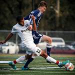 Lynnwood&rsquo;s Rofaiel Dawood steals the ball from Squalicum&rsquo;s Connor Miller during a 3A District 1 Tournament semifinal game on May 9, 2017, at Shoreline Stadium. Lynnwood beat Squalicum 2-1. (Ian Terry / The Herald)